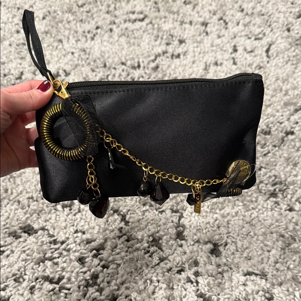 Elegant Black Clutch with Gold Accents